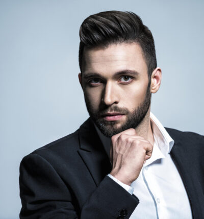 handsome-man-black-suit-with-white-shirt-posing-attractive-guy-with-fashion-hairstyle-confident-man-with-short-beard-adult-boy-with-brown-hair